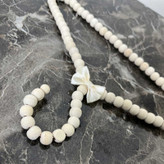 چوب لباسی نوزاد مدل چوبی مرواریدی بسته سه عددی